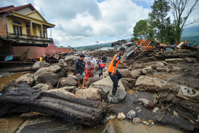 41 die in Indonesia floods, volcanic mud flows